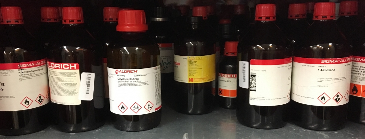 chemical bottles on a shelf